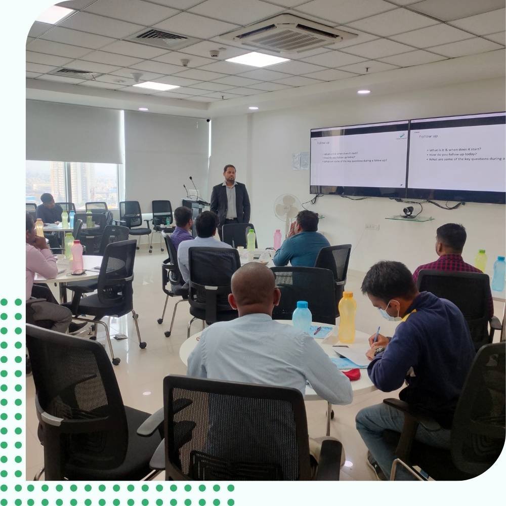 Professional Corporate IT Sales Training Program An expert sales trainer delivering an interactive IT sales training session to sales professionals.