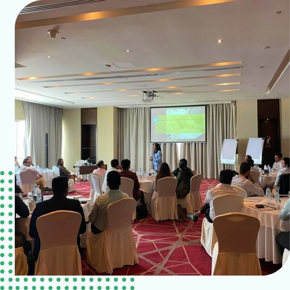 A corporate trainer presenting a medical device ROI and value framework to healthcare sales professionals in India