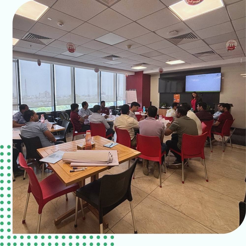 Enterprise Technology Sales Training Workshop A B2B consultant leading an enterprise technology sales training workshop for corporate teams.