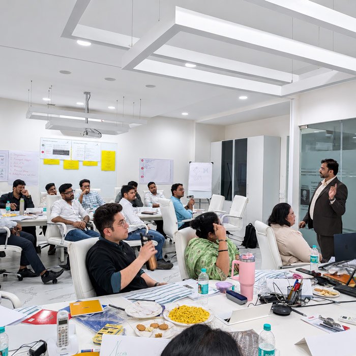 Technology Sales Strategy and Executive Coaching Session An executive sales coach presenting value-based selling strategies to a team of sales professionals.